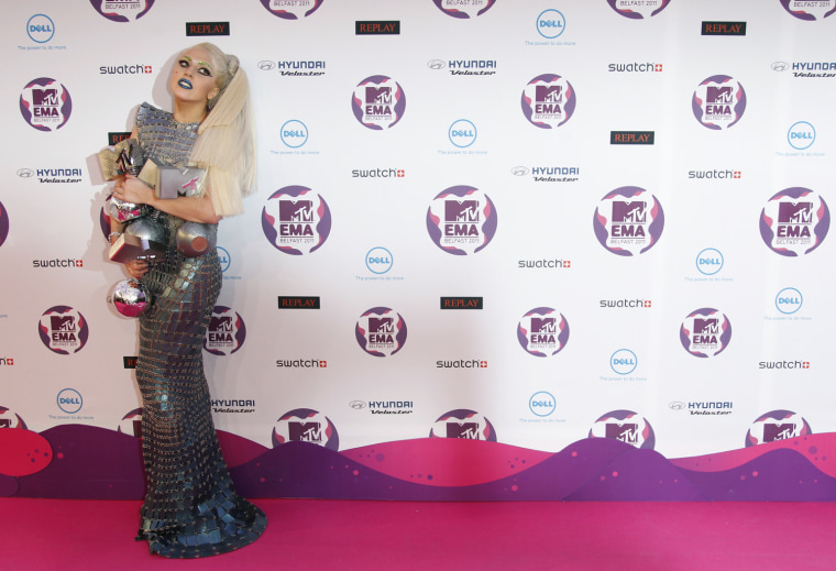 Image: Lady Gaga holds her four awards after the show at the MTV Europe Music Awards show in Belfast